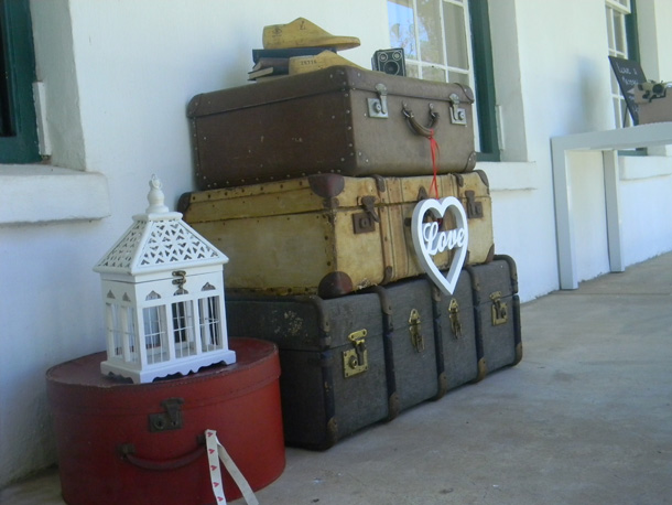 Vintage wedding decor hire suitcases Suitcases displayed in a stack is a